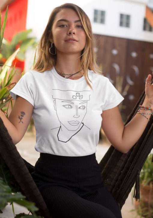 woman with hat and necklace t shirt